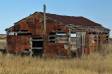 Old barn with Folgers coffee can siding CGS13768 Slide #00000-00000