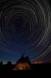 Star Trails appear to make circles over a Ogallala Lakota Sioux teepee in South Dakota Slide #00000-00000