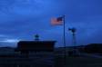 US flag waves in the breeze over the High Plains Homestead IMG_1319 Slide #00000-00000